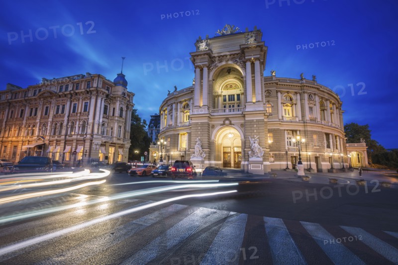 Ukraine, Odessa Oblast, Theater building illuminated at dusk