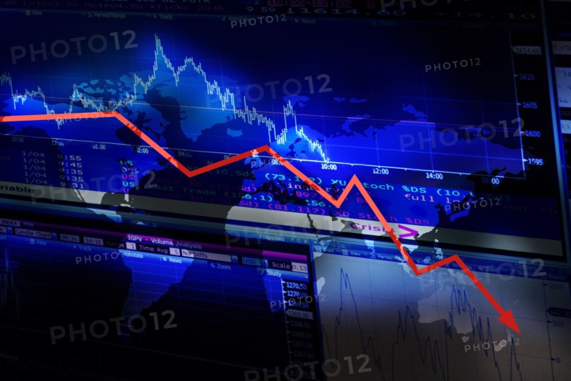 Stock market data and graph moving down