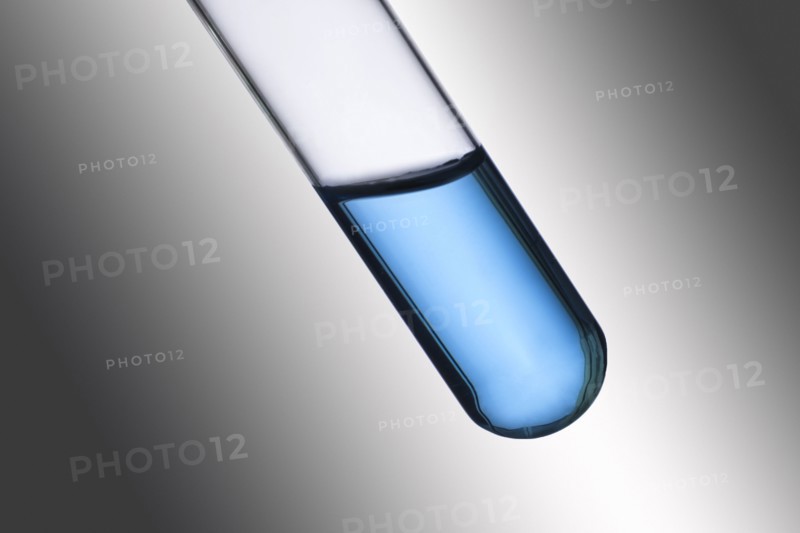 Close-up of test tube with blue liquid