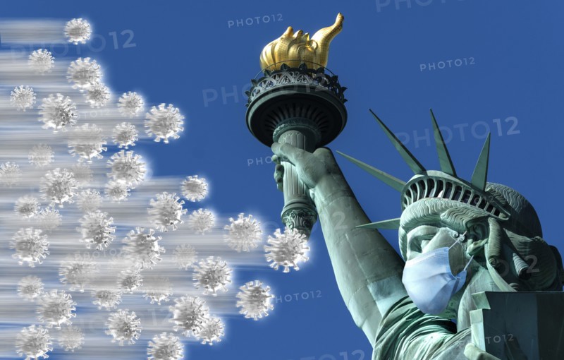 Coronavirus attacking Statue of Liberty wearing surgical mask