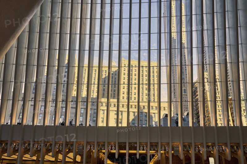 USA, New York, New York City, Modern buildings reflected in glass facade