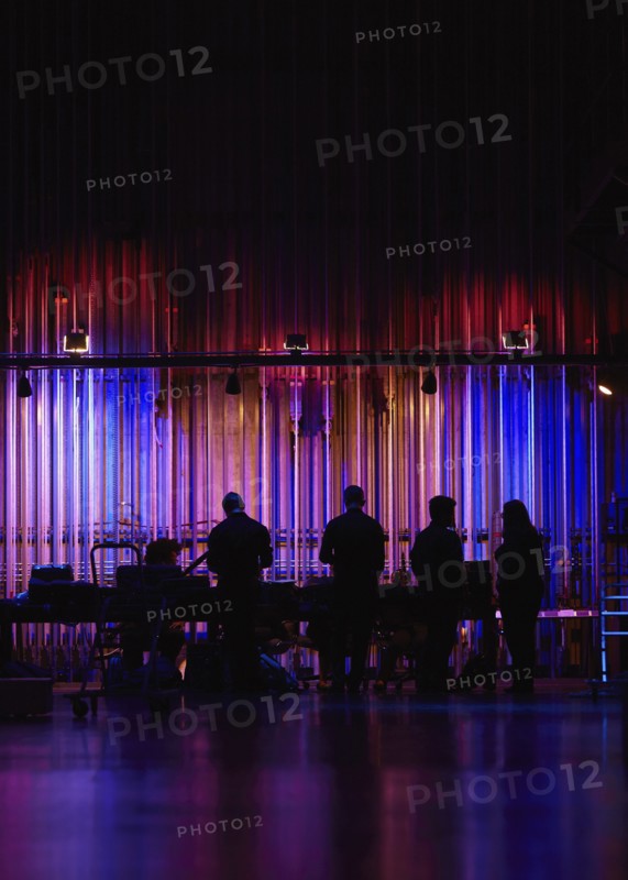 Silhouettes of musicians backstage