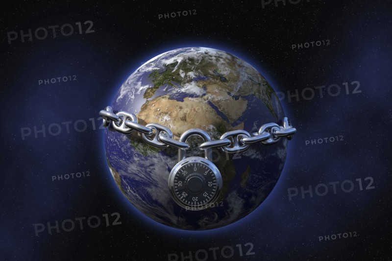 Padlock on chain surrounding globe in space