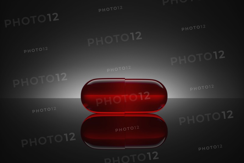Studio shot of red pill