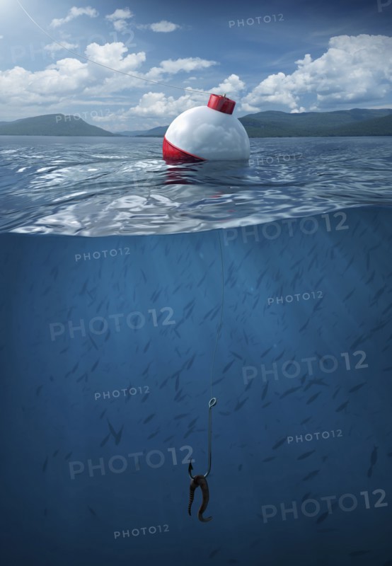 Fishing bobber floating on water