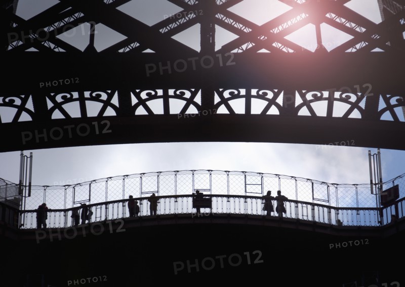 France, Paris, Silhouette of tourists visiting Eiffel Tower