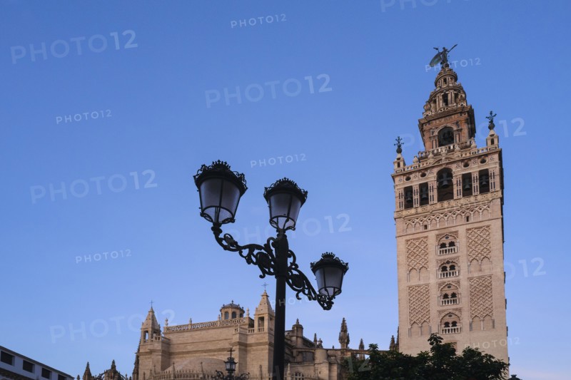 Spain, Seville, High section of Giralda Tower and Seville cathedral