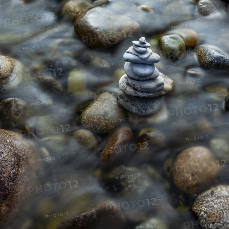 USA, Idaho, Sun Valley, Rock stack among river rocks