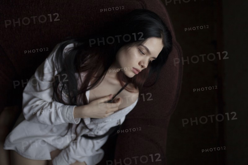 Portrait of young woman with long hair