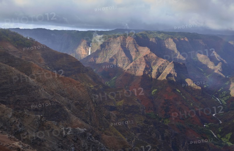 USA, Hawaii, Kauai, Na Pali, Aerial view of mountain range with waterfall