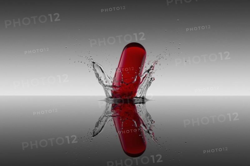 Studio shot of red capsule
