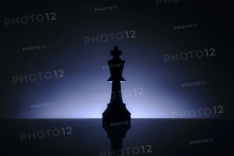 Studio shot of blue chess king