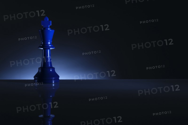 Studio shot of blue chess king