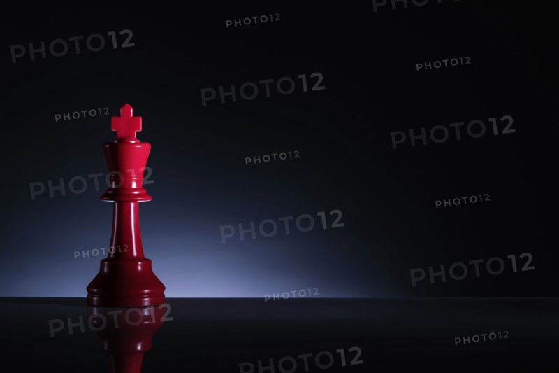 Studio shot of red chess king