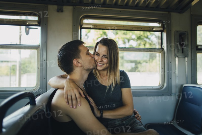 Romantic couple on train