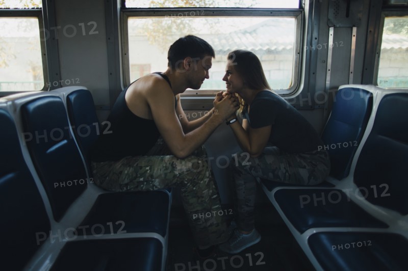 Romantic couple on train