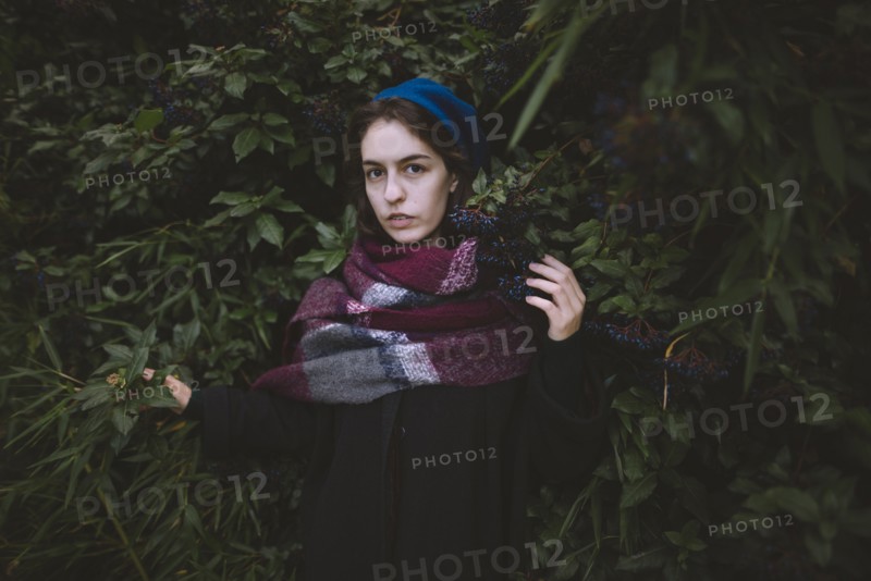 Ukraine, Crimea, Portrait of young woman wearing beret and scarf