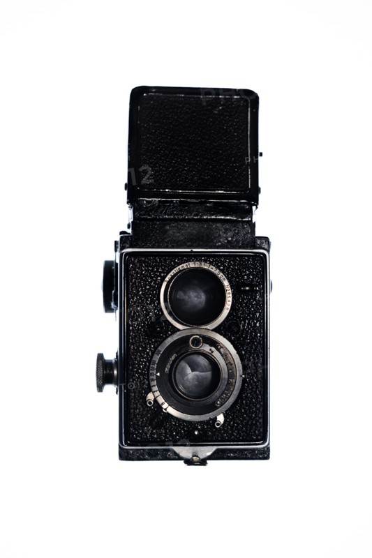 Retro twin lens reflex camera on white