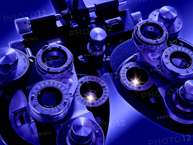 Close-up of phoropter on blue background