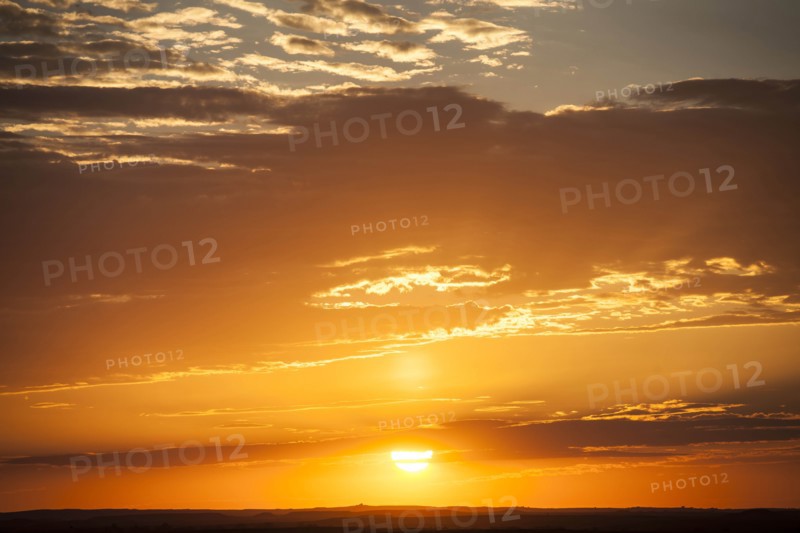 USA, South Dakota, Cloudscape with setting sun
