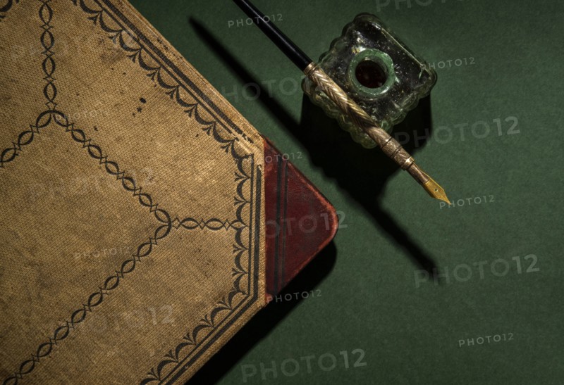 Antique ink well and pen