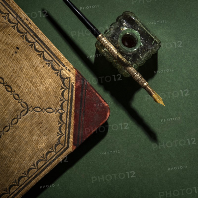 Antique ink well and pen
