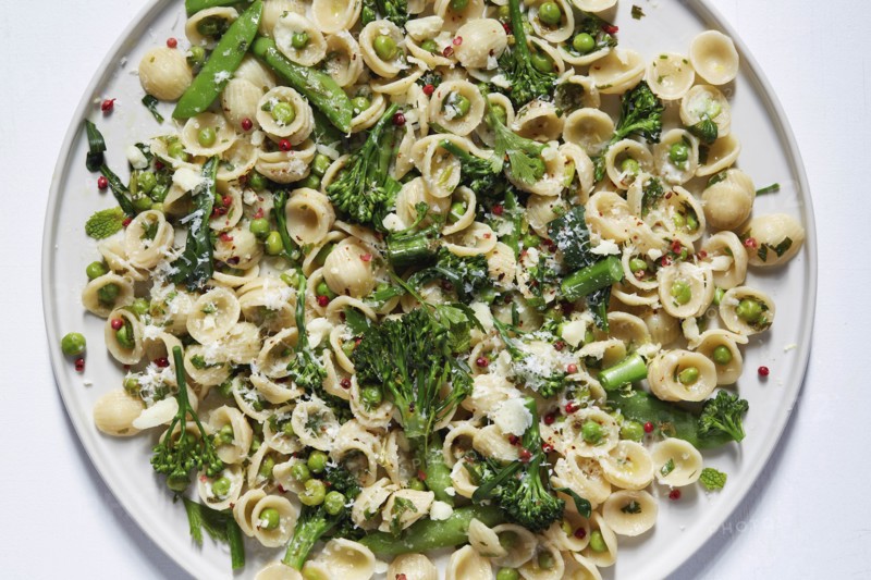 Orecchiette with broccoli and peas on plate