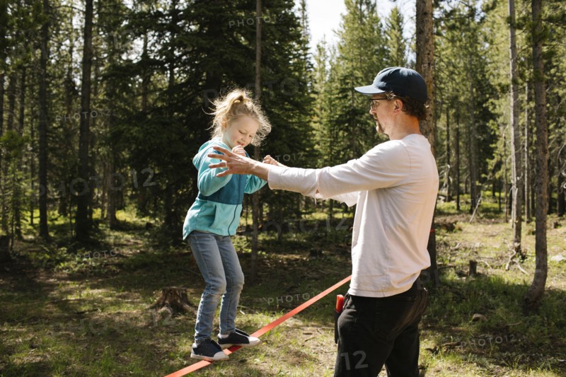 Father assisting daughter