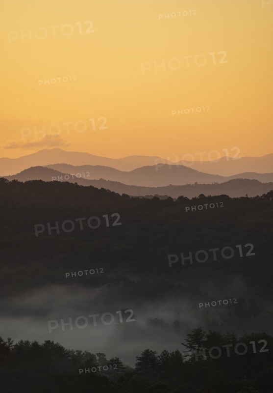 USA, Georgia, Orange sky above Blue Ridge Mountains at sunrise
