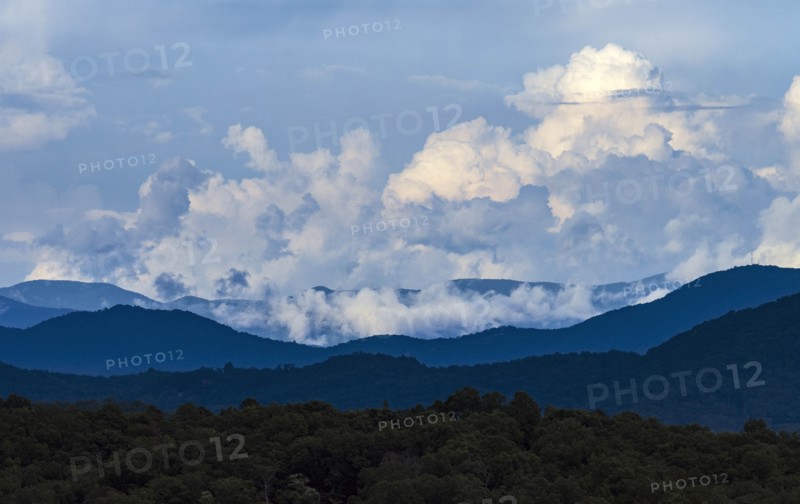 USA, Georgia, White cumulus clouds above Blue Ridge Mountains