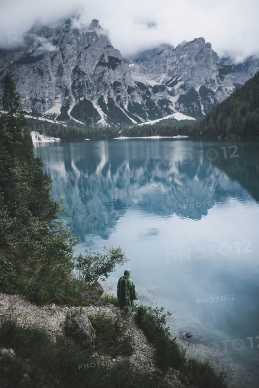 Italy, Pragser Wildsee, Dolomites, South Tyrol, Clouds over mountain lake