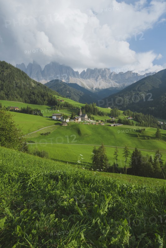 Italy, South Tyrol, Funes, Santa Magdalena, Landscape with village in valley