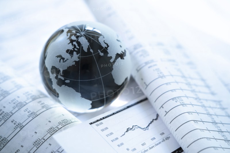 Glass globe an financial documents