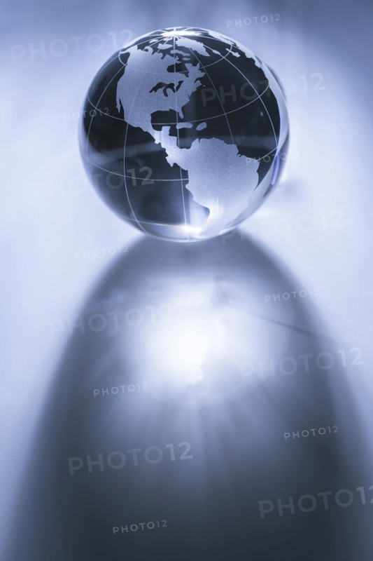 Glass globe on gray background