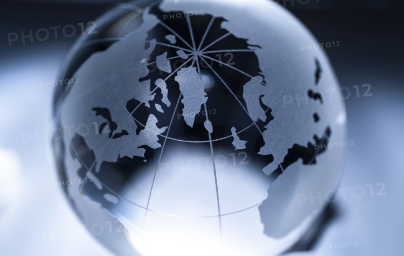 Glass globe on gray background
