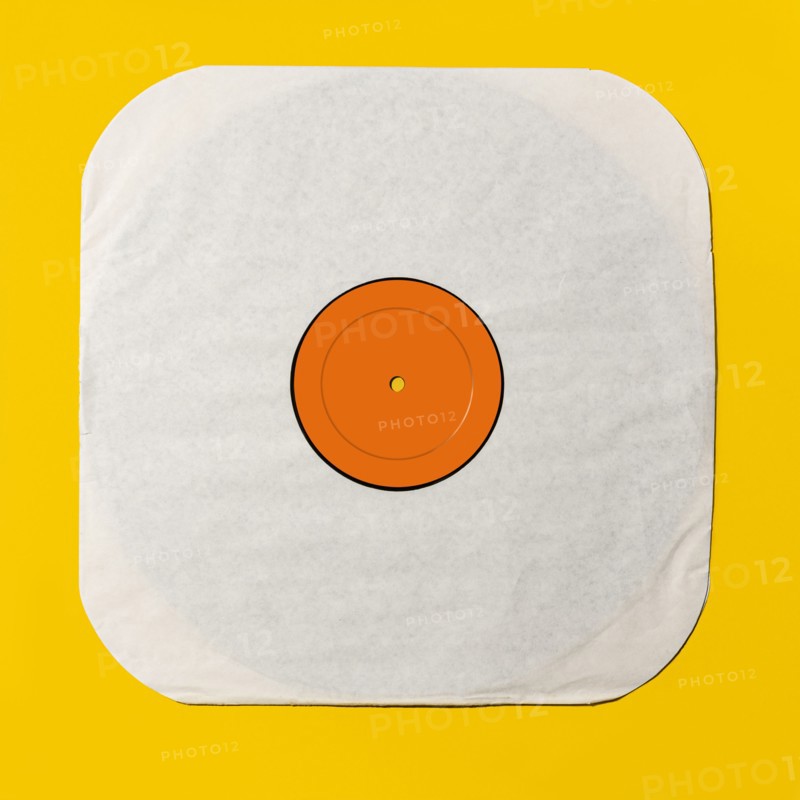 Vintage record on yellow background