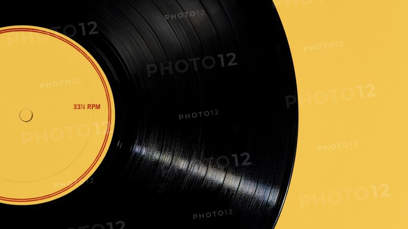 Vintage record on yellow background