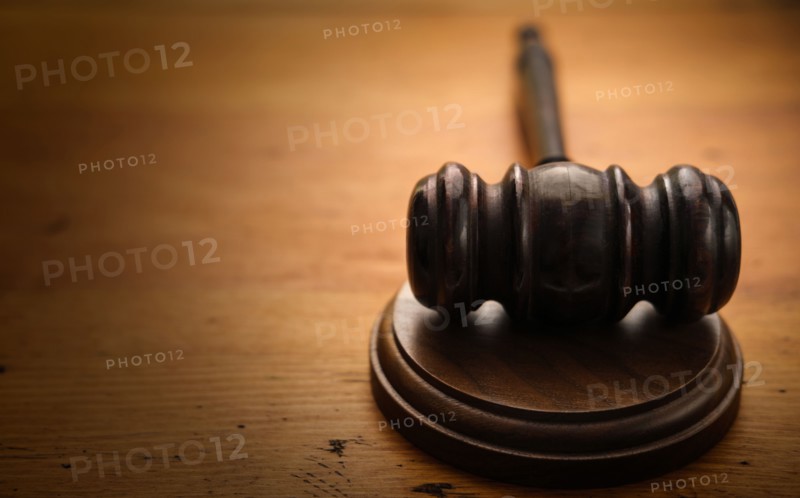 Gavel on wooden background