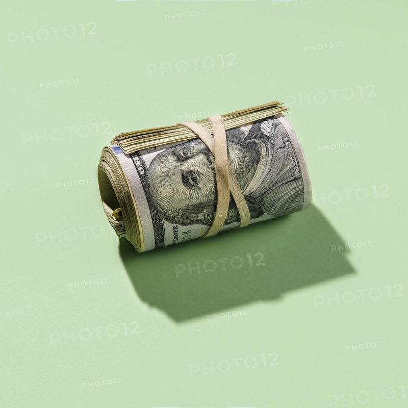 Roll of US dollar bills