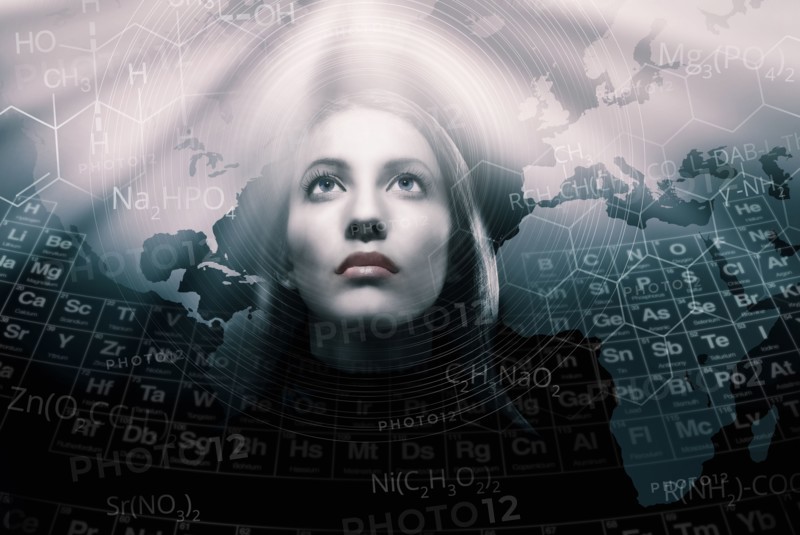 Studio shot of woman over world map