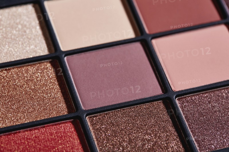 Close up of palette of colorful eyeshadows