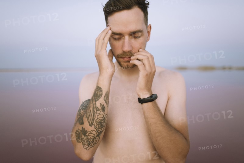 Portrait of shirtless young man