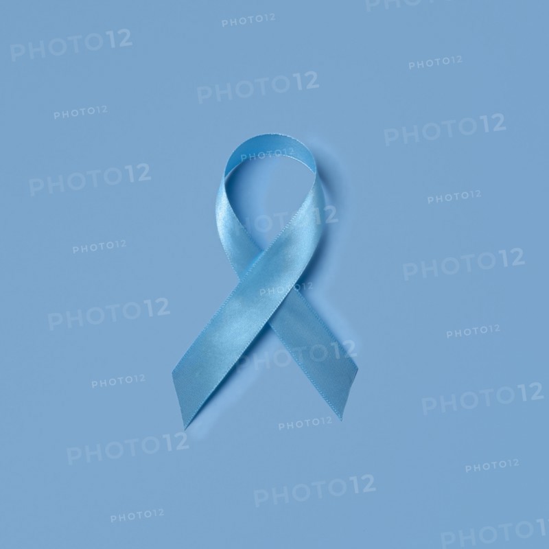 Studio shot of blue ribbon symbolizing prostate cancer