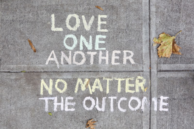 Chalk message on sidewalk