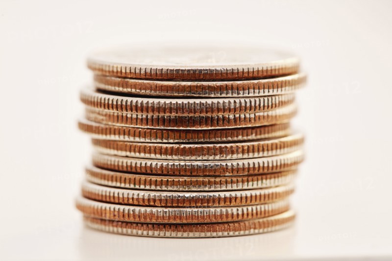 Stack of coins on white background