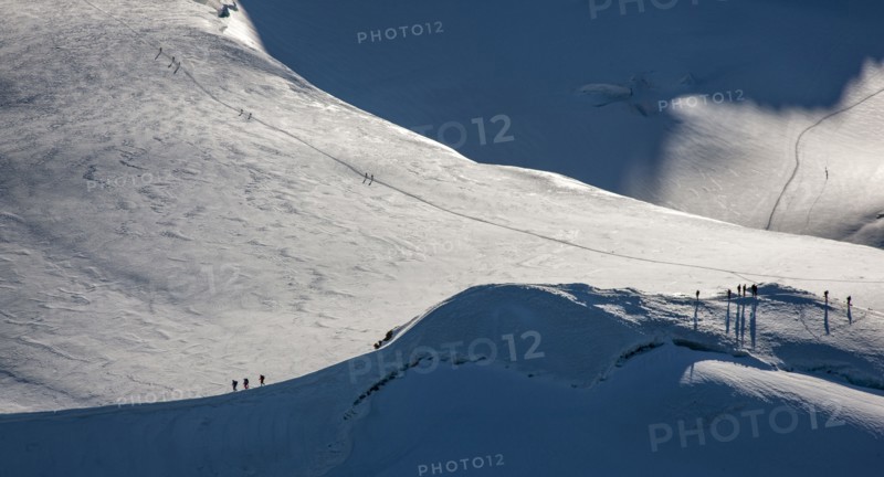 Climbers on mountain ridge at Monte Rosa Massif