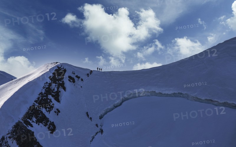 Climbers on mountain ridge at Monte Rosa Massif