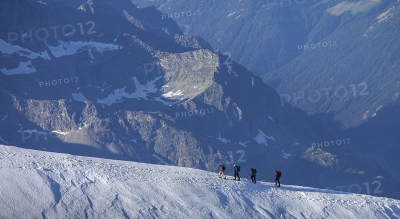 Climbers on mountain ridge at Monte Rosa Massif