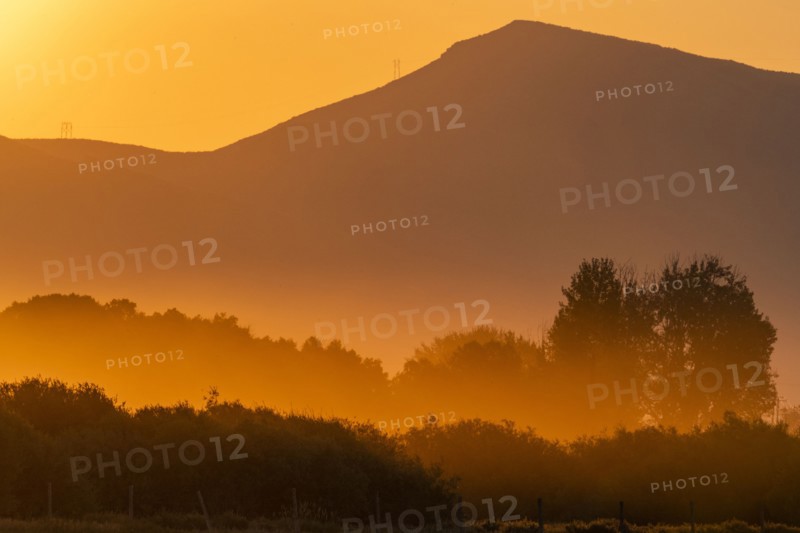 Foggy landscape at sunrise