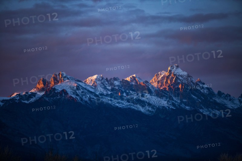 Sunset light on peaks of Teton Range in Grand Teton National Park